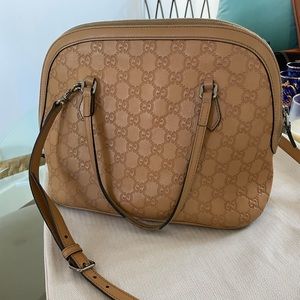 Gucci cream purse used.